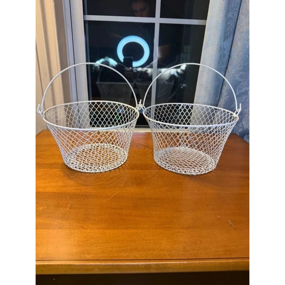 White wire mesh baskets with handles